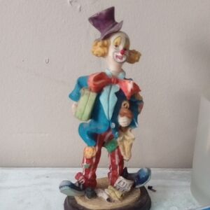 Whimsical Clown Figurine with Blue and Red Accents